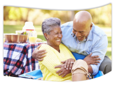 an elderly couple smiling