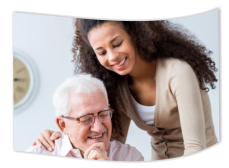 caregiver and elderly smiling